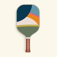 Recess Vista pickleball paddle front view with bold abstract color-block design in navy blue, sky blue, orange, pink, and sage green