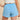 Recess Play Nice sport shorts close-up of light blue fabric and Recess logo detail